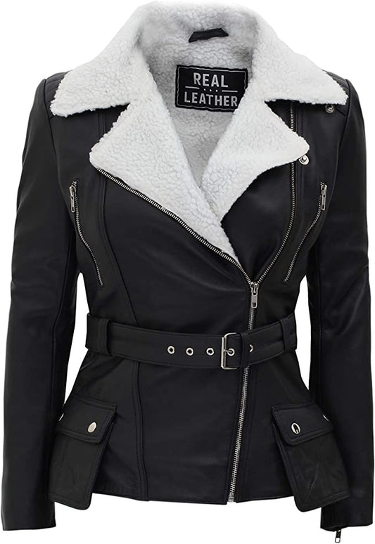 Black faux leather moto jacket with a white sherpa fleece collar, featuring a zippered front, belted waist, and side pockets, shown on a white background.
