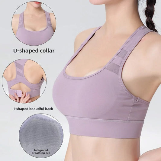 Purple sports bra with U-shaped collar and I-shaped back design, on a plain background.